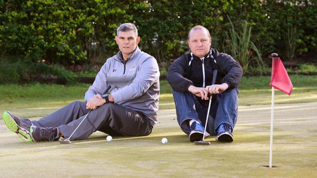 Carl Evans and Craig Baldwin at Logan City Golf Club. Picture: Peter Cronin