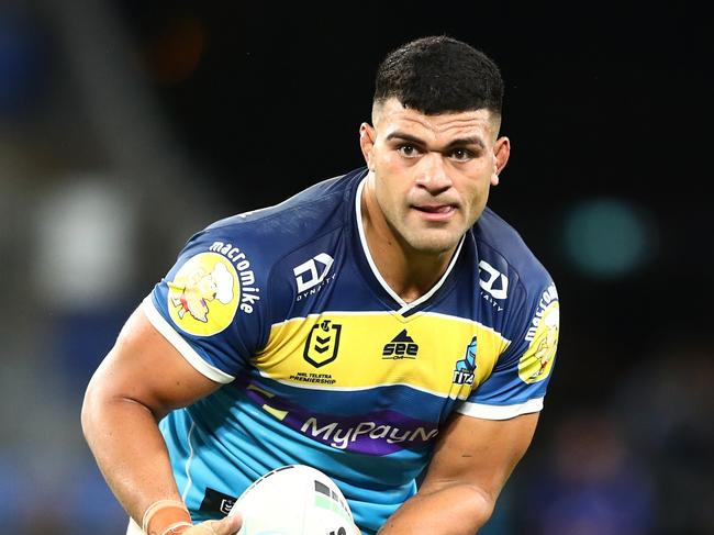 GOLD COAST, AUSTRALIA - MARCH 31: David Fifita of the Titans runs the ball during the round four NRL match between the Gold Coast Titans and the Wests Tigers at Cbus Super Stadium, on March 31, 2022, in Gold Coast, Australia. (Photo by Chris Hyde/Getty Images)