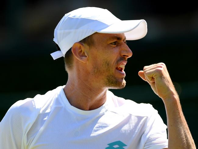 LONDON, ENGLAND - JULY 04: John Millman of Australia celebrates in his Men's Singles second round match against Laslo Djere of Serbia  during Day four of The Championships - Wimbledon 2019 at All England Lawn Tennis and Croquet Club on July 04, 2019 in London, England. (Photo by Matthias Hangst/Getty Images)