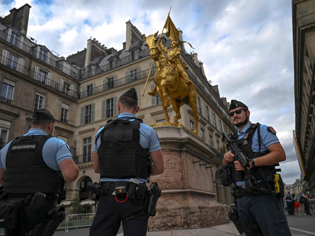 Police officers patrol a security zone around Jeanne d’Arc statue ahead of the Paris 2024 Olympic Games. Picture: AFP