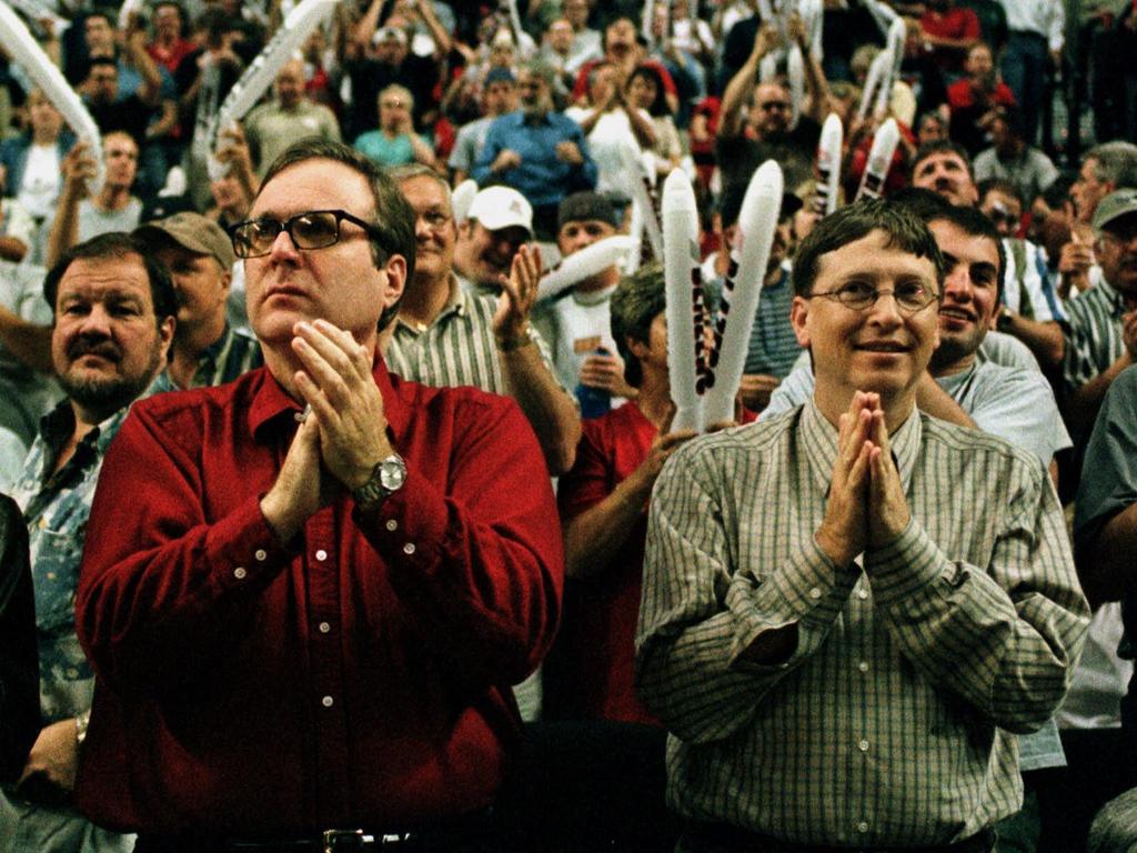 Paul Allen, left, and Bill Gates cheered on the Blazers against the Utah Jazz during the NBA playoffs action in Portland in 1999. Picture: AP