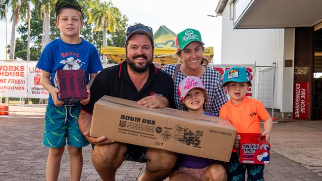 Callum Garnett, Michelle Garnett, Evie Garnett, Mason Garnett and Leyton Garnett at the Fireworks Warehouse at Darwin show grounds sale on Territory Day. Picture: Pema Tamang Pakhrin