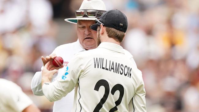 Umpire Marais Erasmus inspects the ball as Kane Williamson looks to get a replacement. Picture: AAP