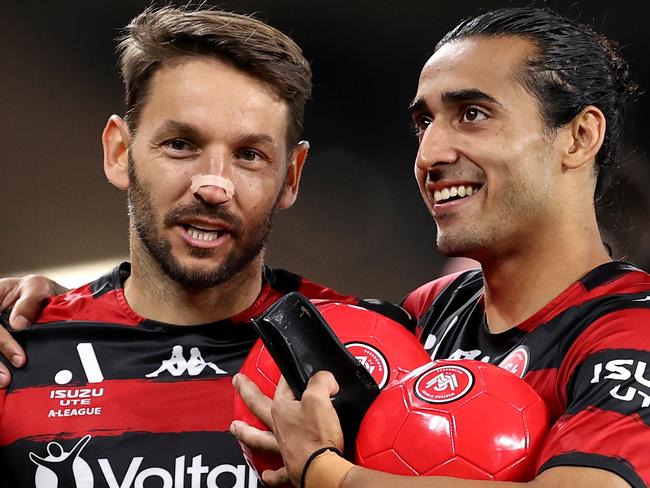 SYDNEY, AUSTRALIA - OCTOBER 28: Milos Ninkovic and Gabriel Cleur of the Wanderers celebrate at full time during the round four A-League Men's match between Western Sydney Wanderers and Newcastle Jets at CommBank Stadium, on October 28, 2022, in Sydney, Australia. (Photo by Brendon Thorne/Getty Images)