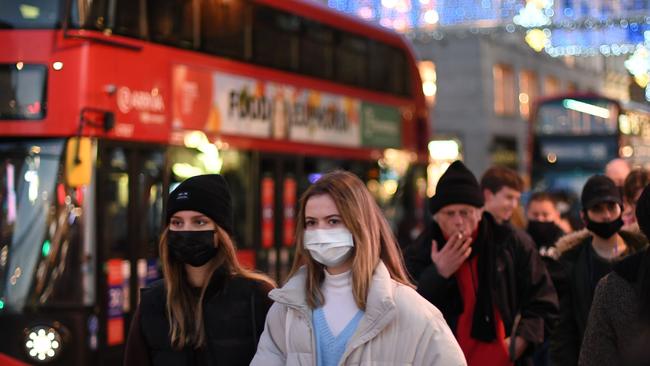 With an increase in Covid and flu infections, British health authorities are again telling sick people to stay at home or wear masks if they have to go out. Picture: Daniel Leal-Olivas/AFP