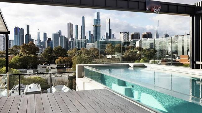 The Penthouse at Palmerston Crescent, South Melbourne, comes with a heated saltwater pool with views back to the city’s southern skyline