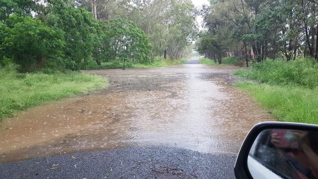 Water pictured over the road on Biggenden Gooroolba Road. Image credit: Angela Berrie.