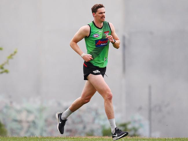 Joe Daniher runs laps at Tullamarine.