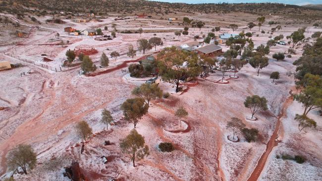 The hail and frost created a stunning contrast with the red soil.