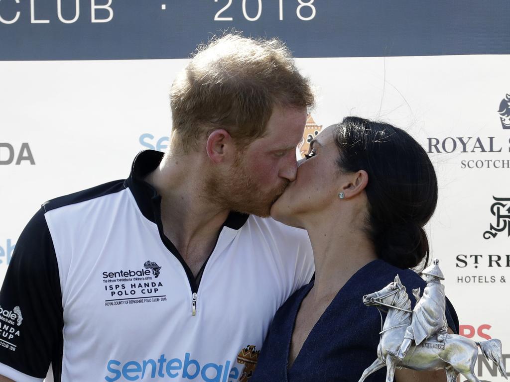 Smooching at a polo event. Picture: Matt Dunham/AP File)