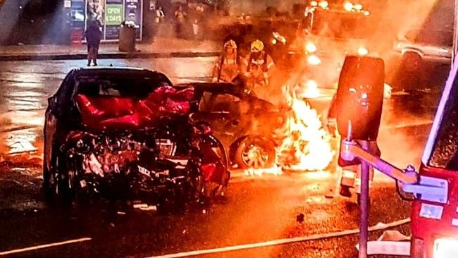 The blaze was extinguished but the vehicle was destroyed after a crash on Elizabeth Drive, Liverpool. Picture: Fire and Rescue Macarthur