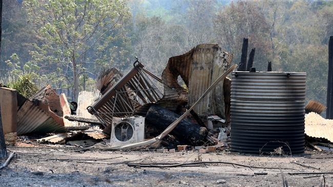 The charred remains of the 1910 farmhouse on Bulga Rd owned by Kim Macdonald. Picture Nathan Edwards.