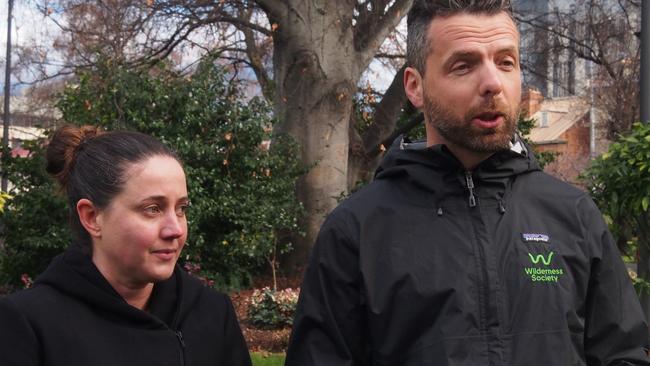 Environmental Defenders Office special counsel Claire Bookless and Wilderness Society campaign Manager Tom Allen speak to the media in St Davids Park, Hobart.