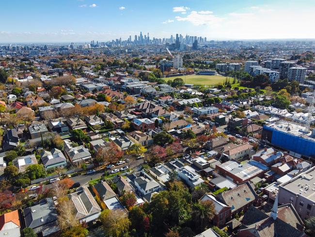 Aerial view of houses in Armadale, looking towards the Melbourne city skyline.