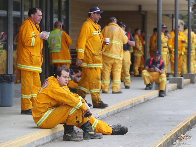 Firefighters take a break from fighting a bushfire in the Beaufort area. Picture: David Crosling