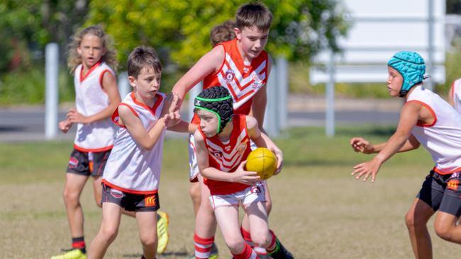 JUNIOR FOOTY: In the AFL U11 R4 at Cavanbah Oval, Byron Bay, the Lismore vs. Burleigh game saw the Swans go down by 115 to 1-0-6 to 18-8-116. Photo: Daniel Cohen