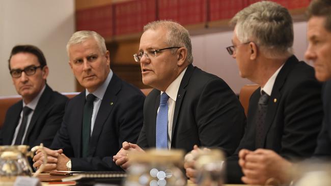 Scott Morrison meets departmental secretaries at Parliament House in Canberra yesterday. Picture: AAP