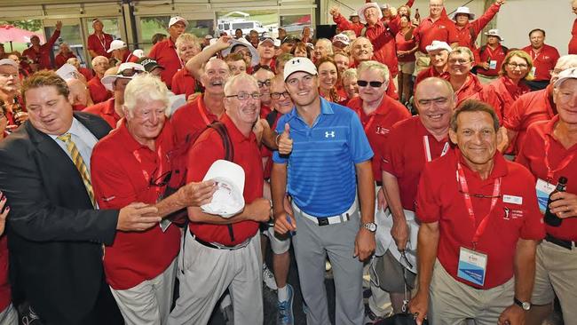 Volunteers celebrate after a final round.