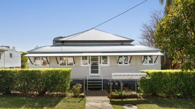 This house, which has been converted to a block of units at 54 Broadway St, Woolloongabba, is on the market.