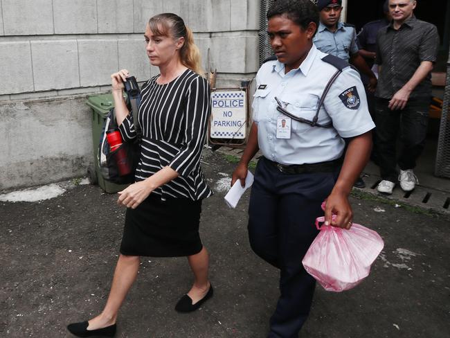 The couple leave court after the dramatic hearing. Picture: Gary Ramage