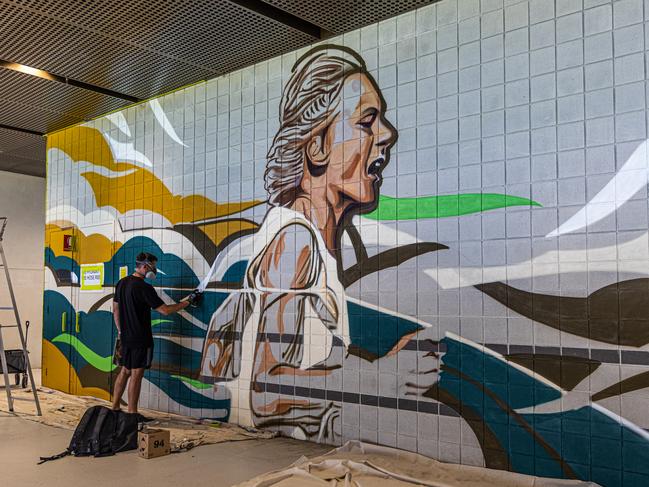 Mural of Betty Cuthbert being installed at Allianz Stadium