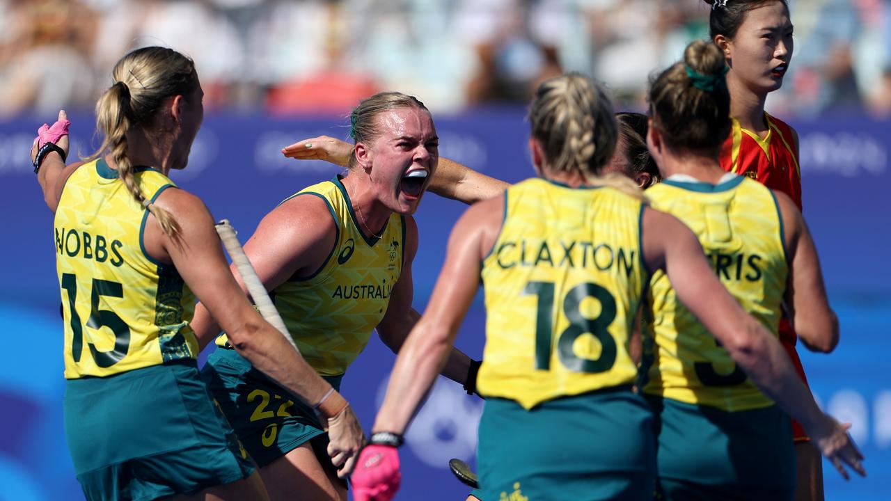 Tatum Stewart of Team Australia (2L) celebrates scoring her team's second goal with teammates during the Quarter Final Women's match between Australia and People's Republic of China. Photo: Luke Hales/Getty Images