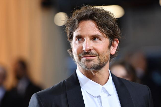 <p>In the world of leading man charm, few do it better than <a href="https://www.gq.com.au/grooming/hair/bradley-cooper-hair/image-gallery/bdd8ad08845256600a12bc2eee97cfbf" target="_blank" rel="noopener">Bradley Cooper</a>. The amiable Pennsylvanian thespian has commanded audiences for around two decades, and has built a career around playing men at the precipice of total collapse, a feeling many of us know well, which is likely what&rsquo;s made him so relatable and well-adored.&nbsp;</p><p>&nbsp;</p><p>On-screen, the chameleonic actor has played everything from aggressive jocks, a struggling musician, a talented sniper, a school teacher with a rogue streak, and most recently one of the most important American composers in history, Leonard Bernstein in the upcoming film <em>Maestro</em>. He&rsquo;s a chameleon in front of the lens and behind it, garnering nominations for nine Academy Awards in his time&mdash;as well as winning two Grammys.&nbsp;</p><p>&nbsp;</p><p>With all those accolades, Cooper is obviously no stranger to the red carpet. Marking himself as a dependable leading man in any context, Cooper&rsquo;s style typically follows just as reliable of a blueprint. From his early days spent in a lithe slim fit suit, to the emergence of more pronounced <a href="https://www.gq.com.au/style/trends/smart-casual-mens-outfits/image-gallery/c6f250cf00f1c482d3ea0094c4e8df93" target="_blank" rel="noopener">smart casual menswear</a> moments in a double-breasted blazer and the like, Cooper&rsquo;s red carpet style is built on a solid foundation. He&rsquo;s not the most risk-taking of stars, preferring to dabble in slight riffs on classics to make his presence felt at premieres.&nbsp;</p>