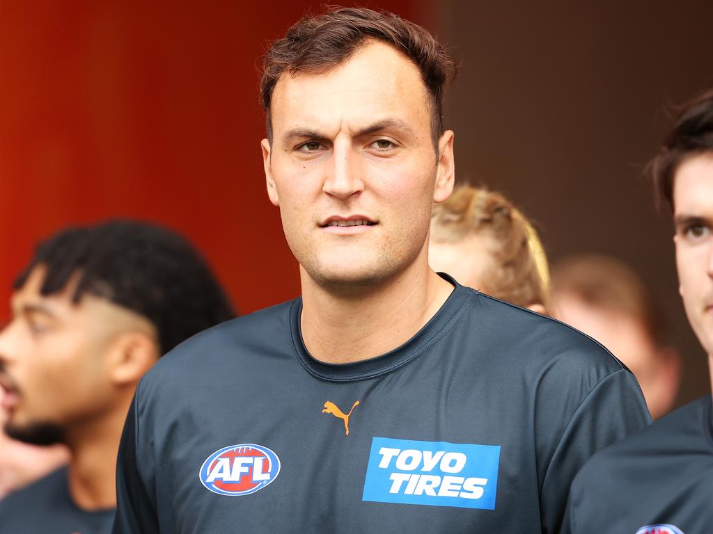 SYDNEY, AUSTRALIA - MAY 15: Braydon Preuss of the Giants looks on as he walks out for the warm-up before the round nine AFL match between the Greater Western Sydney Giants and the Carlton Blues at GIANTS Stadium on May 15, 2022 in Sydney, Australia. (Photo by Mark Kolbe/Getty Images)