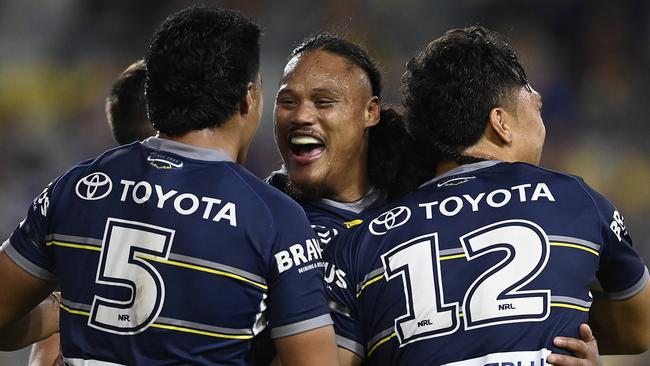 TOWNSVILLE, AUSTRALIA - AUGUST 19:  Luciano Leilua of the Cowboys celebrates after scoring a try  during the round 23 NRL match between the North Queensland Cowboys and the New Zealand Warriors at Qld Country Bank Stadium, on August 19, 2022, in Townsville, Australia. (Photo by Ian Hitchcock/Getty Images)