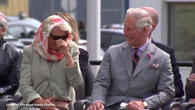 Prince Charles and Camilla laugh during native Canadian ceremony