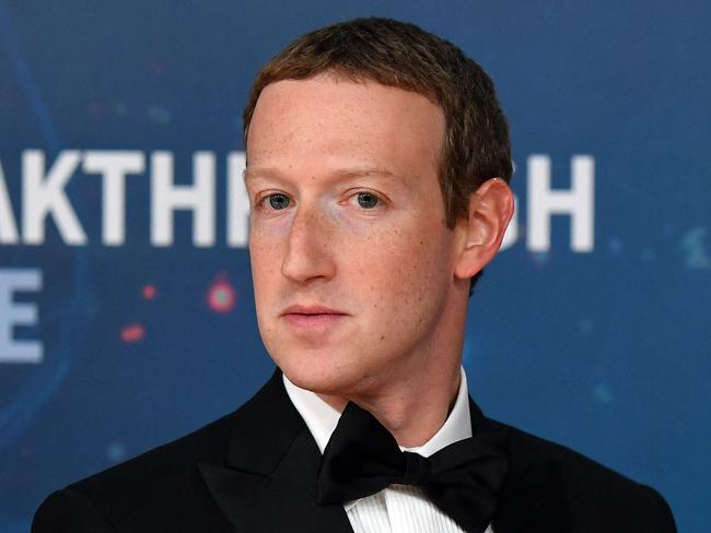 (FILES) In this file photo taken on November 03, 2019 Facebook CEO Mark Zuckerberg arrives for the 8th annual Breakthrough Prize awards ceremony at NASA Ames Research Center in Mountain View, California. - Facebook-parent Meta put out word to employees on September 29, 2022 that it will freeze hiring to cut costs as it endures tough economic times, The Wall Street Journal reported. Meta chief Mark Zuckerberg revealed a planned pause in hiring during a weekly all-hands meeting, the Journal reported, saying the move came as the social media titan planned to cut expenses by at least 10 percent. (Photo by JOSH EDELSON / AFP)