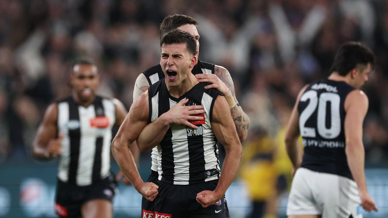 MELBOURNE, AUSTRALIA – AUGUST 03: Nick Daicos of the Magpies celebrates kicking a goal during the round 21 AFL match between Collingwood Magpies and Carlton Blues at Melbourne Cricket Ground, on August 03, 2024, in Melbourne, Australia. (Photo by Daniel Pockett/Getty Images)