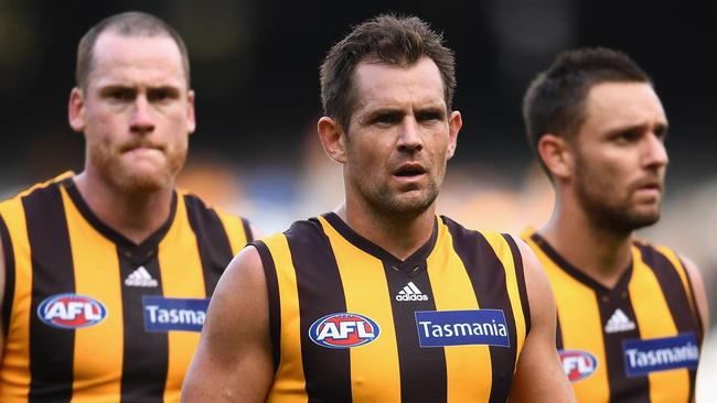 Jarryd Roughead, Luke Hodge and Jack Gunston. (Photo by Quinn Rooney/Getty Images)