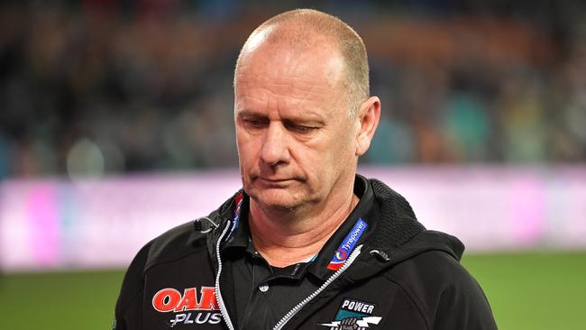 Ken Hinkley the coach of the Power walks from the field looking dejected after the round 21 loss. Picture: Getty Images