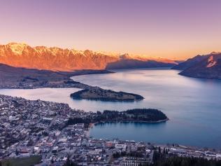 Queenstown and Lake Wakatipu at sunset.Photo: iStockEscape20 February 2022Savvy - Queenstown New Zealand