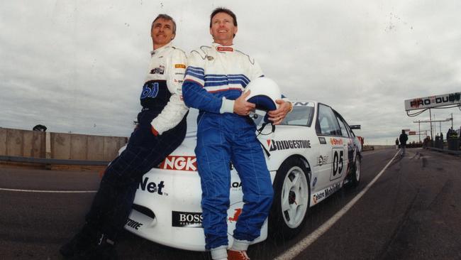 SA rally champion Ed Ordynski with Peter Brock and his Holden Commodore at Mallala race track in 1995.