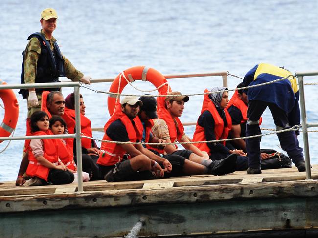 Thousands of asylum seekers are still waiting to be processed.
