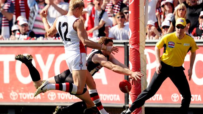 Nick Riewoldt runs into an open goal, only to have his kick smothered by Heath Shaw. Cue a Dennis special. Picture: Colleen Petch