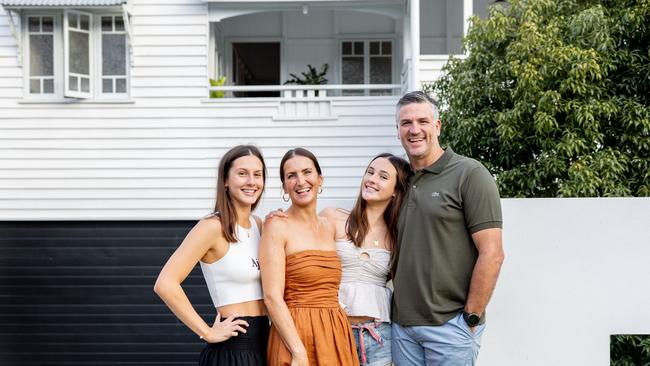 Dennis with wife Mia and daughters Matilda, 17 (left), and Poppy, 13, standing in front of Dennis’ beloved Betty. Picture by Luke Marsden.