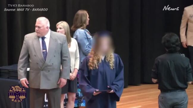 Dad's shock move at daughter's graduation