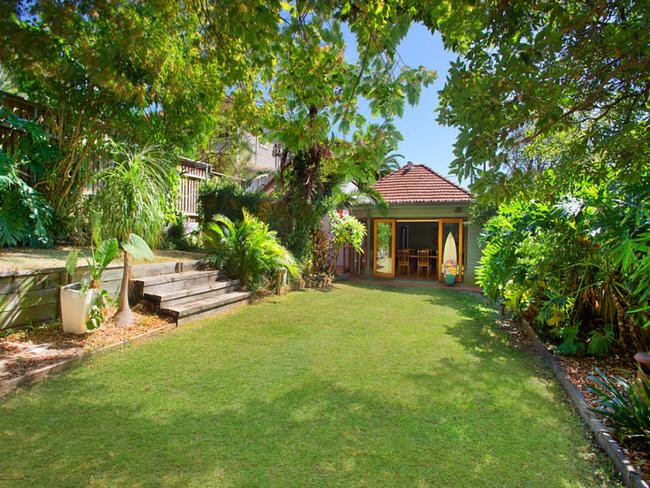 Plenty of room to kick a ball in the long backyard.