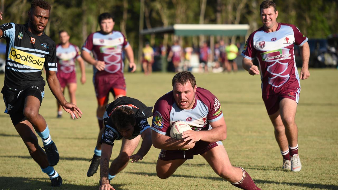 Royce Blair goes over for one of his two tries for the Isis Devils.