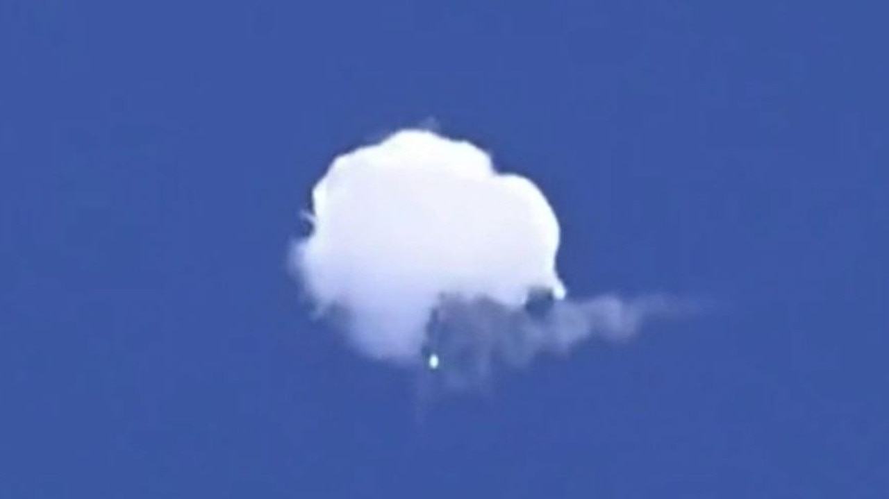 The moment a US fighter jet shoots down the suspected Chinese spy balloon. Picture: Angela Mosley