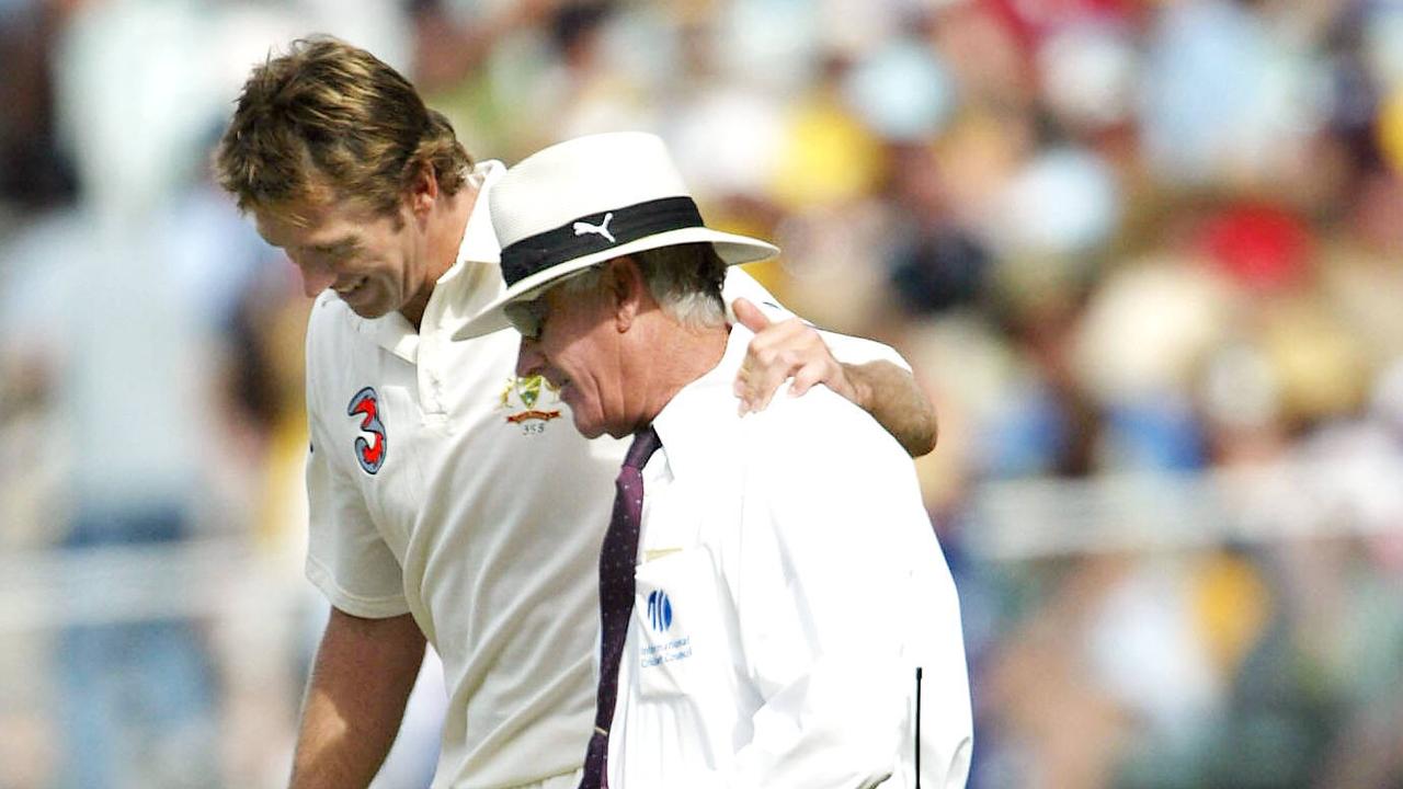 2004 Boxing Day Test. Cricket. Australia v Pakistan. MCG. Day One. Glenn McGrath has a chat with umpire Rudi Koertzen.