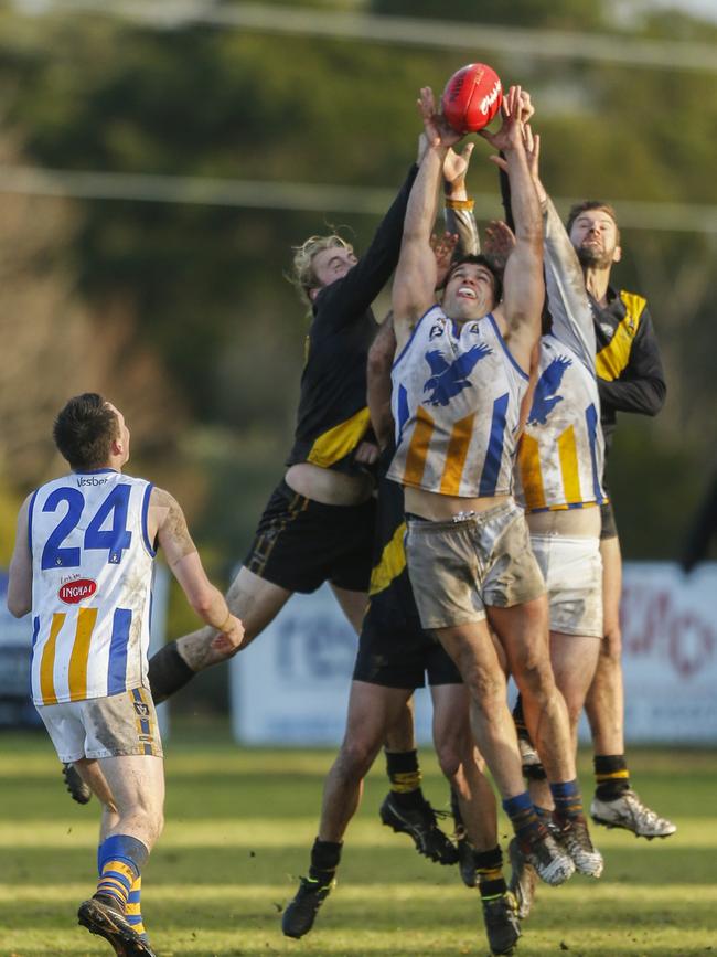 Eagles star Paul Fermanis tries to mark in front. Picture: Valeriu Campan