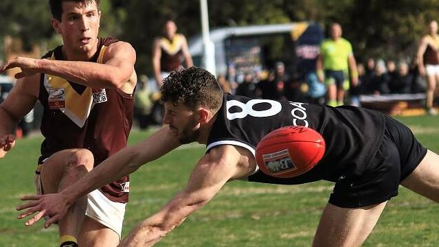 Luke Hannon kicks a goal for Boronia in the 2018 Division 3 grand final. Picture Davis Harrigan