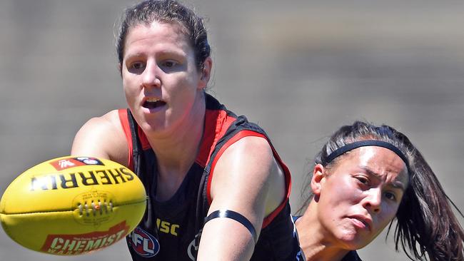 Adelaide Crows AFLW draftee Jess Foley tacked by Justine Mules.