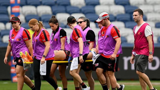 Amber Clarke is stretchered from the field in the second term. Picture: Josh Chadwick/Getty Images