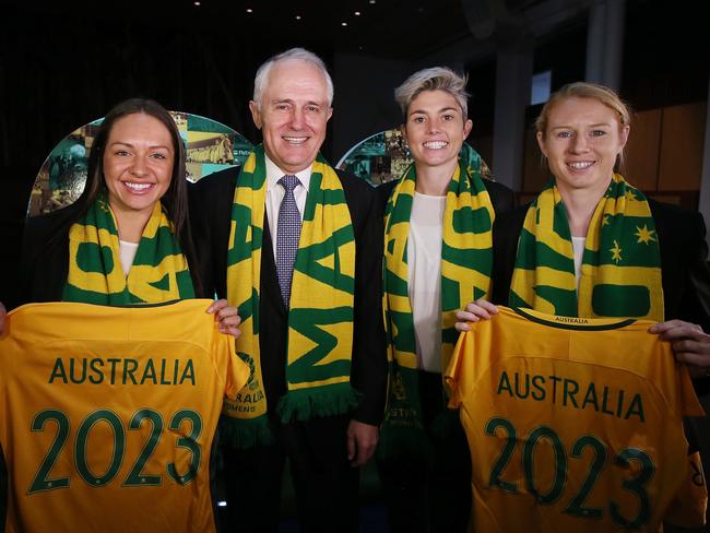 PM Malcolm Turnbull with Matildas Kyah Simon, Michelle Heyman and Clare Polkinghorne when announcing a bid for FIFA Women's World Cup at Parliament House in Canberra. Pic: Kym Smith