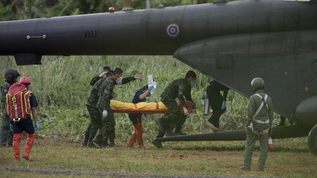 The final students taken to the helicopter on a stretcher bound for Ching Rai hospital. Twelve students and their football coach trapped in the Thum Luang caves in Chiang Rai province, Thailand. Pictures by Dan Charity 10-07-18